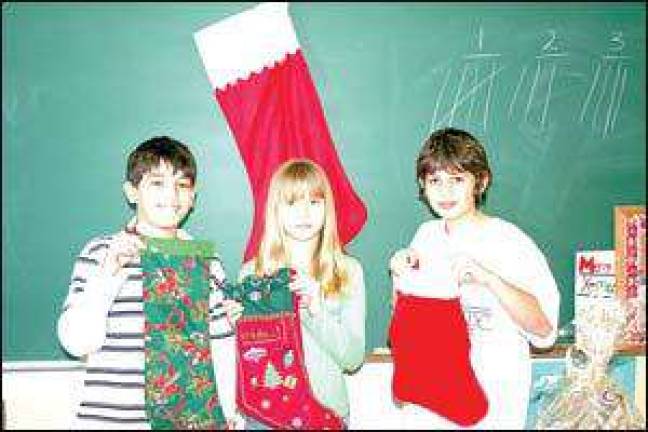 Fifth graders learn about cultures during the holiday season