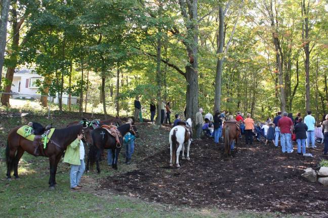 Horses wait on the trail during the Blessing of the Animals Mass at St. Joseph Church. The annual event brings out animals large and small. Photo by Ginny Raue