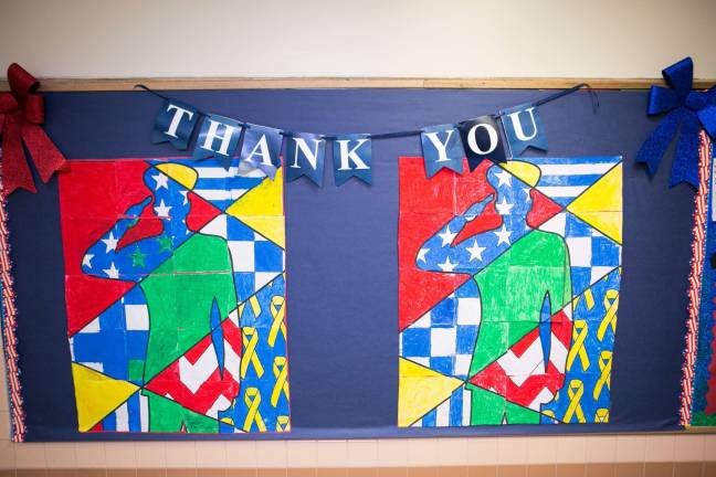 Patriotic artwork showing appreciation for veterans line the halls at Paradise Knoll School.