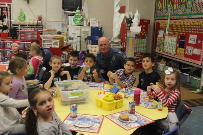 Bagels, coloring books and plenty of smiles at the breakfast with police.