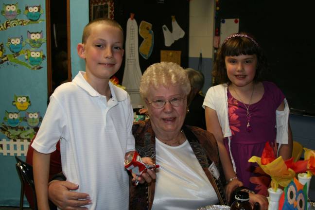 Grandparents and their grandchildren enjoyed lunch together as part of the day. Here, Jonathan and Victoria from West Milford are happy to have their grandma with them at school.