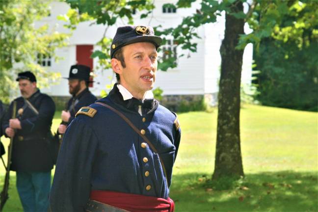 [Members of the 6th New Hampshire regiment Union Civil War reenactors hold a demonstration at the Long Pond Ironworks State Park in Hewitt on Saturday. Charles Kim photo]