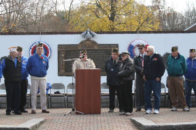 VFW Commander Bill Johnson reminded the veterans assembled that they are an elite group. "How can we ever thank you enough," he said.