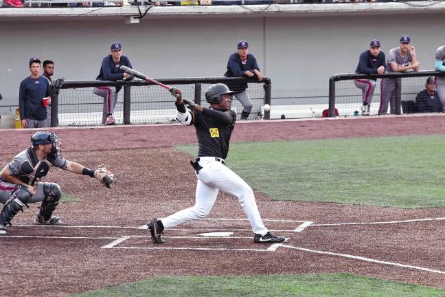 <b>MN4 The ball goes into foul territory after being hit by Miners batter Mahki Backstrom in the second inning. He scored one run in the game.</b>
