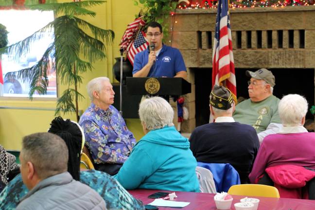 Chris Falone welcomes veterans to Camp Hope's thank-you lunch.
