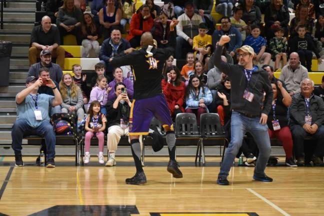 Members of the Harlem Wizards got the crowd up and dancing.
