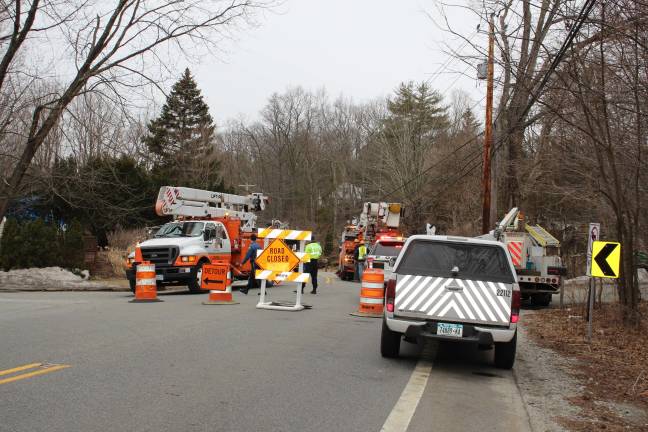 Photo by Ginny Raue Union Valley Road was closed for nearly 10 hours on Tuesday when power lines and a utility pole came down after being hit by a pre-fab house being moved on a flatbed.