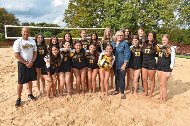 Mayor Michele Dale poses with West Milford High School volleyball players and coaches.