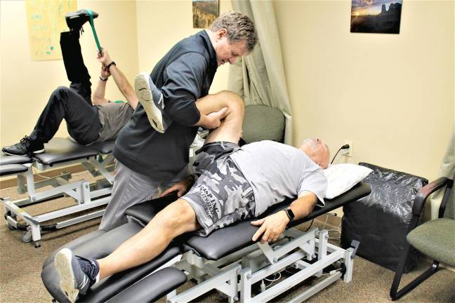 JAG-ONE Physical Therapy's Clinical Director Sean Kane with a patient.