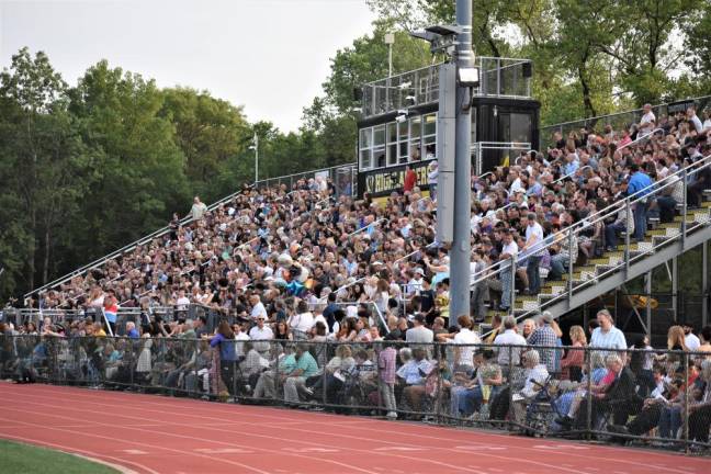 Family and friends of the graduates fill the grandstand.