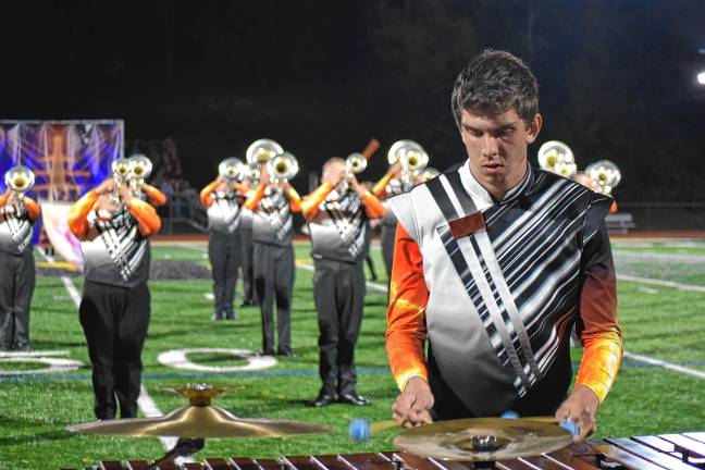 Junior Evan Riley in front of the horn section.