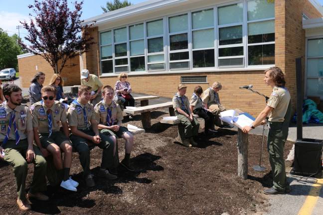 Photos by Don Webb Alex Kerssen is seen speaking at the outside classroom he built as his Eagle Scout project.