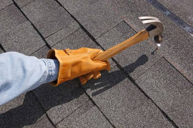 School board approves contract for Sandy-damaged roof repairs