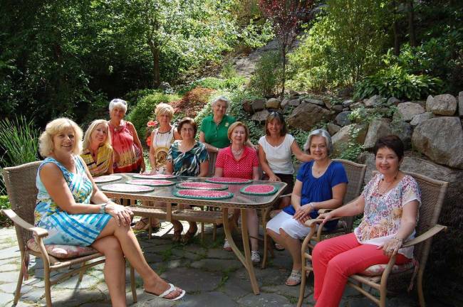 The Broader Horizons Book Club includes, from left, Gwen Gangi, Tory Ross, Norma Stehle, Kim Murray, Elaine Cornetto, Madonna Hayes, Sabina May, Debbie Grimmelmann, Jenelle Hopkins and Sara Garcia. Missing from the photo are Katy Nordt, JoAnne Carbone, Nancy Hereema and Cheryl Bell. The woman meet each month to discuss their chosen book. They've done so for 25 years now.