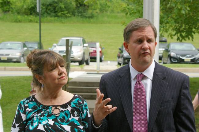 Photo by Chris Wyman Susan Kehoe and her attorney Daniel Perez speak to the crowd outside the Vernon Municipal Court and in front of the Vernon Municipal Building, after her trial was postponed on Tuesday afternoon.