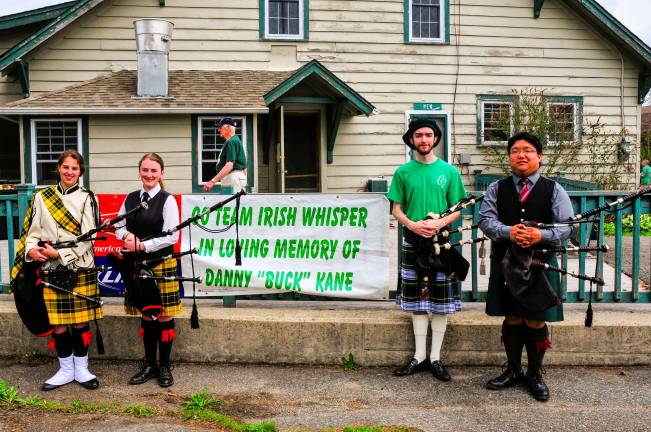 The Highlander's Pipers played for the walkers.