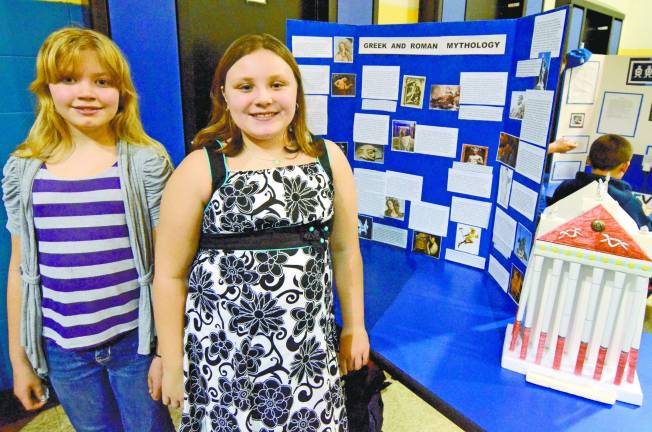 Photos provided by Ken Greenberg Amelia Taylor and Meghan Kirwan enjoy Greek Mythology, and it was evident by their knowledge of the subject.