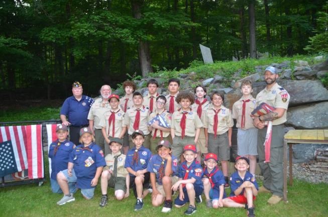 Greenwood Lake American Legion CDR Vincent Hallinan (top left), with GWL Boy Scout Troop 121 and Cub Scout Troop 121 at a flag retirement ceremony on June 12, 2025.