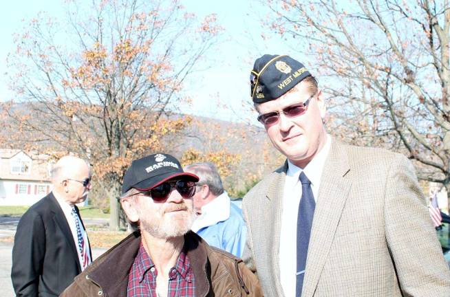 Messenger photographer and reporter Don Webb, right, who is also the American Legion Post 289 chaplintakesamomenttothank Marinevet Jack Barrows.