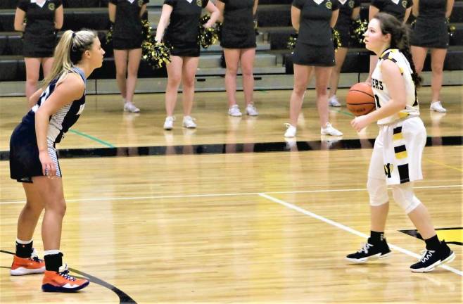 West Milford’s point guard assesses the defense during a loss to Wayne Valley at home Jan. 28.