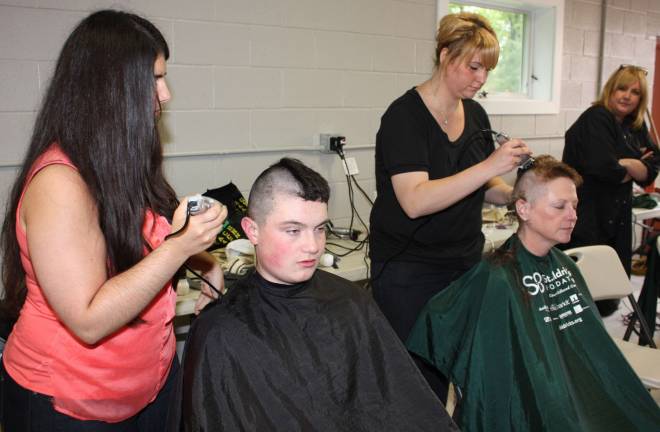 Mother and son team, Sal and Christine Alessio, undergo the buzzer together.