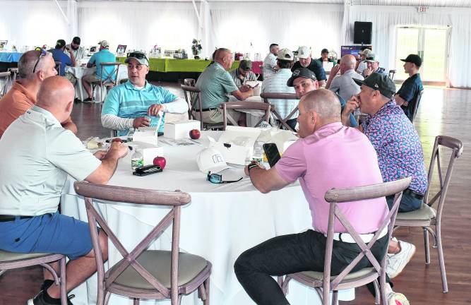 Participants also sat down for a meal after golf.