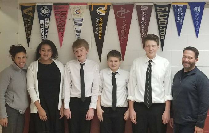 Photo provided. From left, Macopin music teacher, Erica McPartland, Gianna Edmond, Corran Vaughn, Shane Duffy, Kade McDaniel, and Principal Marc Citro.