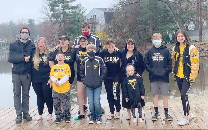 Coaches, athletes, volunteers, families and supporters cheered the polar plungers.