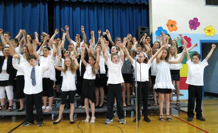 Photos by Patricia Keller The chorus had the audience up and singing along.