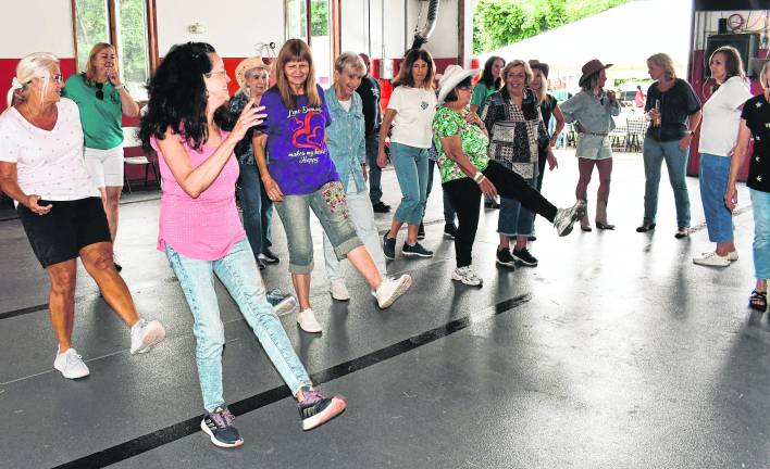 Participants dance.