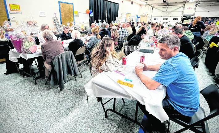 The West Milford Rescue Squad building was packed with people attending the beef steak fundraiser for the Babcock family.