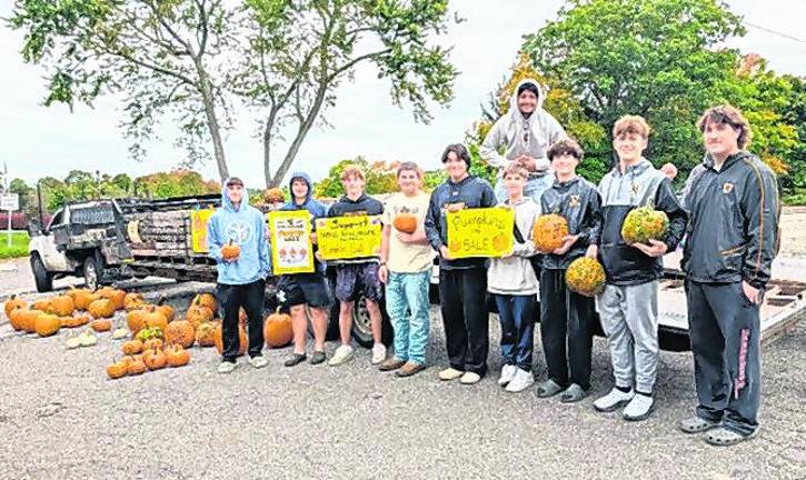 West Milford Highlander Football team members held a pumpkin sale fundraiser at Bubbling Springs Park on Sunday, Oct. 4.