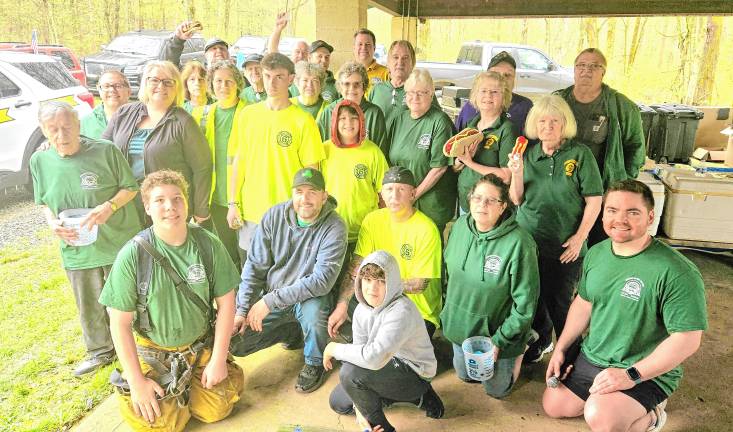 Township officials and volunteers pose at a picnic to thank them for helping with the Beautification Day cleanup.