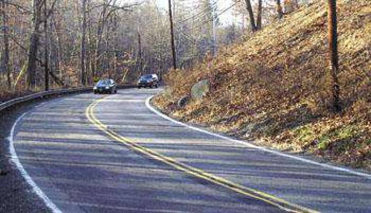 Dead Man's Curve repairs face spring start