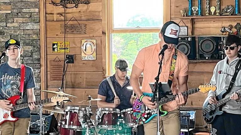 The Brotherhood Band plays during Clam N Jam on Friday, Aug. 8 in the Pennings Farm Market Beer Garden. (Photo courtesy of Brotherhood Band)