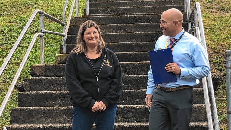 Marcia Kershaw, center, president of the Upper Greenwood Lake Elementary School PTA, with new school Principal Jay Alloy.