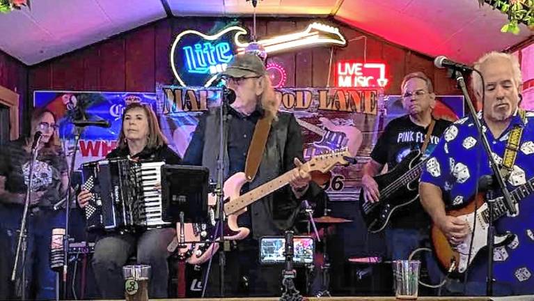 Maplewood Lane performs an outdoor concert Thursday evening at the Bubbling Springs Rotary Gazebo. (Photo courtesy of Maplewood Lane)