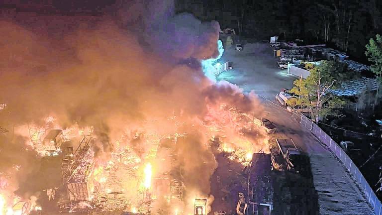 Crews battle large junkyard fire on Weaver Road in West Milford
