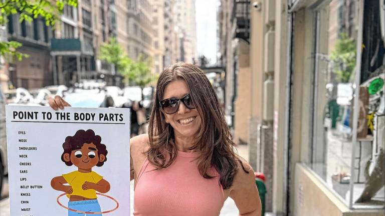 Eva Treistman of Hewitt and her daughter, Zoe, promote her children’s book, ‘I Cannot Find My Belly Button!’