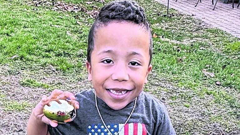 Jaymeson Hayward shows off an egg.