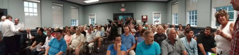 The room quickly filled for a hearing Tuesday, Aug. 28, at the Zoning Board of Adjustment meeting to discuss a proposed dump site in West Milford for New York City garbage. Photos by Kalleen Rose Ozanic