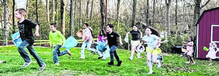 Children attending the West Milford Elk’s Good Friday Fish Fry on April 3 searched for hundreds of candy-filled Easter eggs.