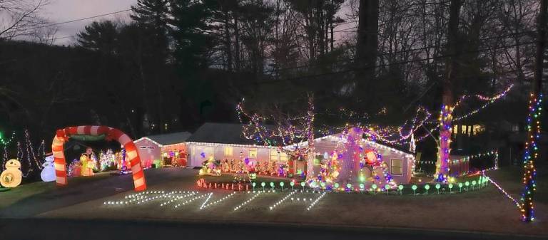 West Milford. Neighbors lifting spirits with holiday lights in Crescent Park