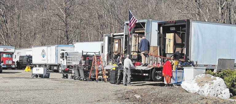 Trucks fill a parking lot near the Town Tavern on Macopin Road on March 19. Mayor Michele Dale said a film permit was taken out by the company that produced ‘The Night Agent’ on Netflix. (Photos by Rich Adamonis)