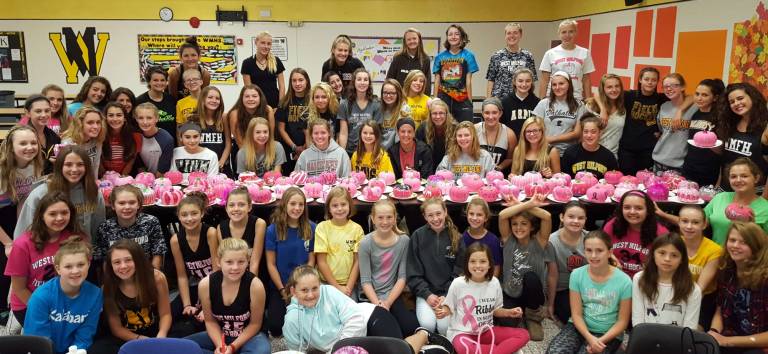 Field hockey players from all levels got together last Saturday for breakfast and to paint pumpkins for the &quot;Play 4 the Cure&quot; game on Thursday.
