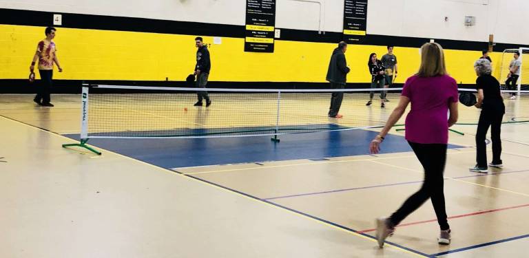 Photo by Julie TomaroStudents and adults play in a recent pickleball tournament at West Milford High School.