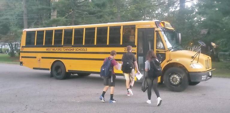 Students get on the bus in West Milford on the first day of school Tuesday, Sept. 7. Photo by Patricia Keller.
