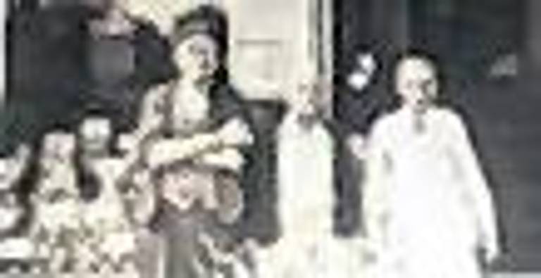 Arthur Olden, born in 1890, is seen in front of his Great Eastern Grocery Store in Hewitt. Gus Herman is at left. The man in center is only identified as Tom.