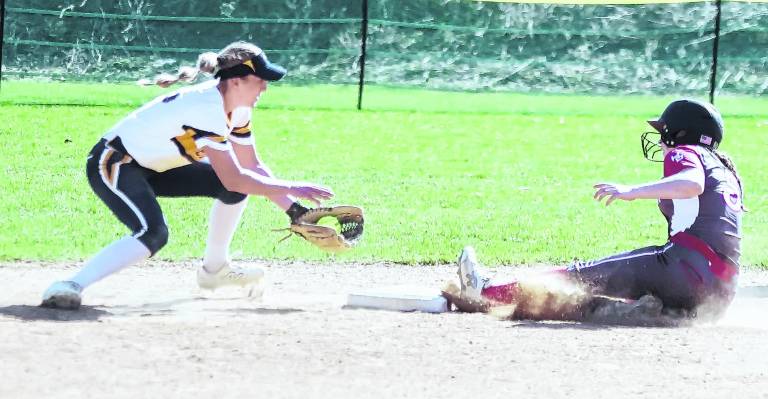 <b>High Point base runner Emma Palomo slides safely into second base beating the tag by Jefferson infielder Kylie Plunkett.</b>