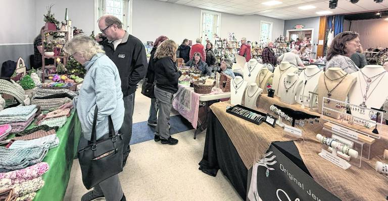 Visitors peruse the Christmas Craft Fair.